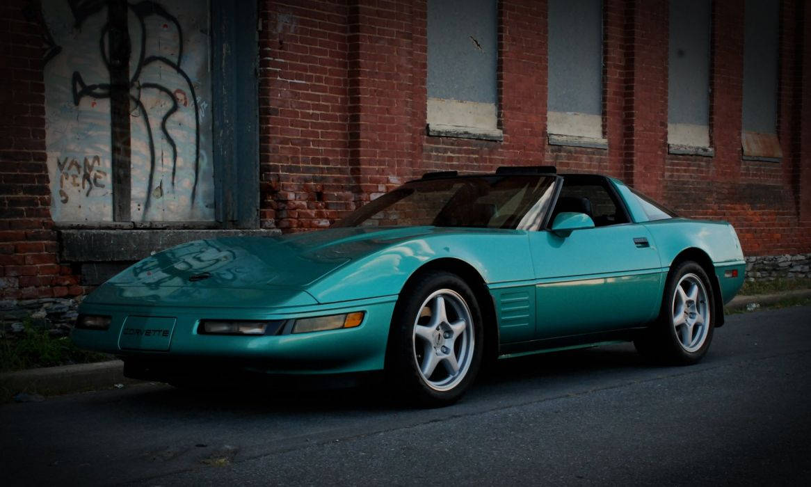 Shiny Blue C4 Corvette Convertible Retro Classic Background