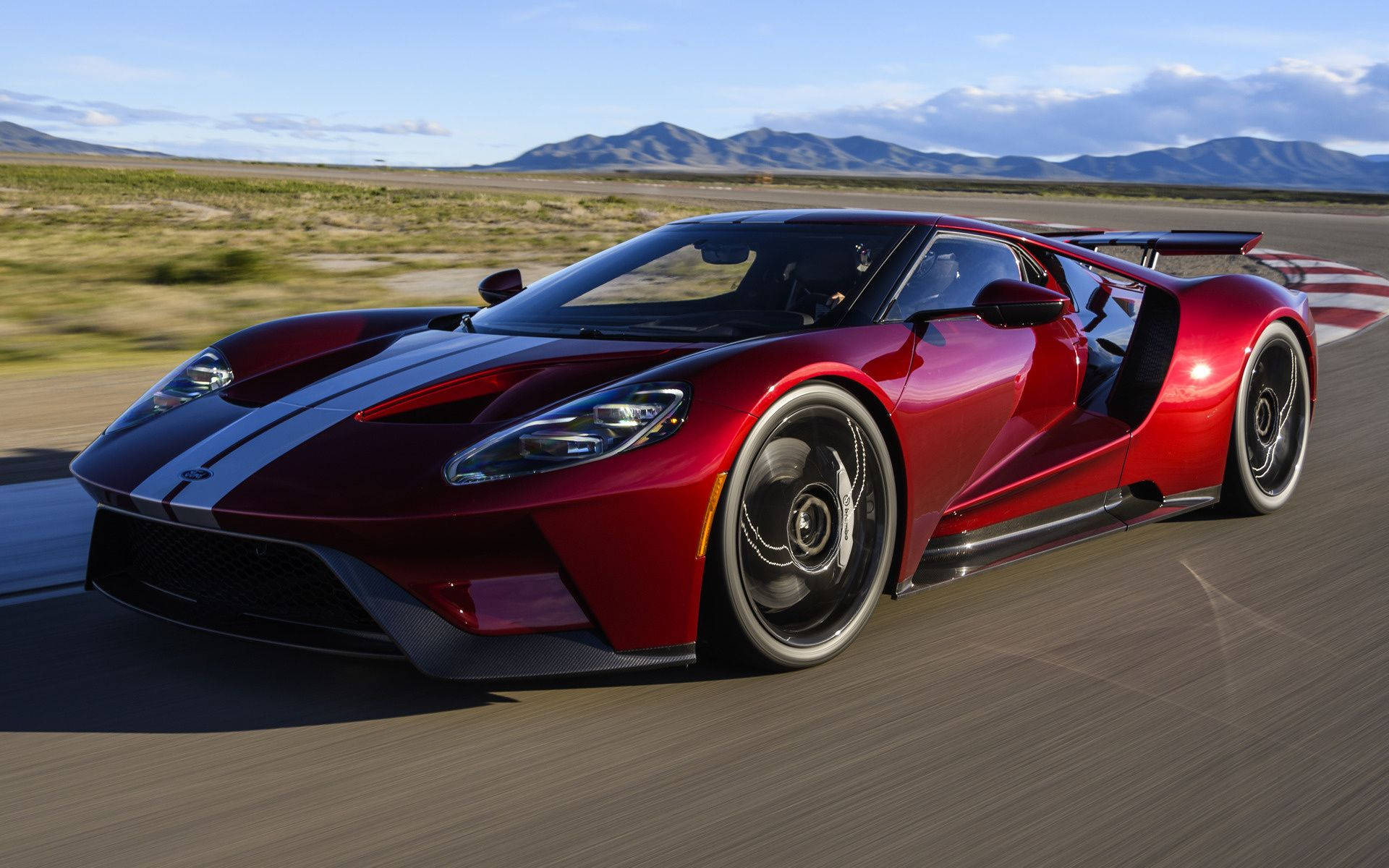 Shiny Red Ford Gt Sports Car Background