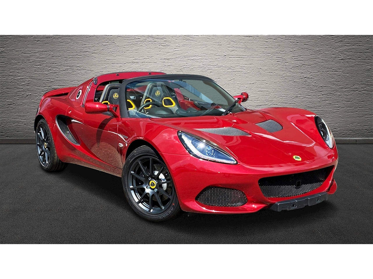 Shiny Red Lotus Elise Sports Car Background