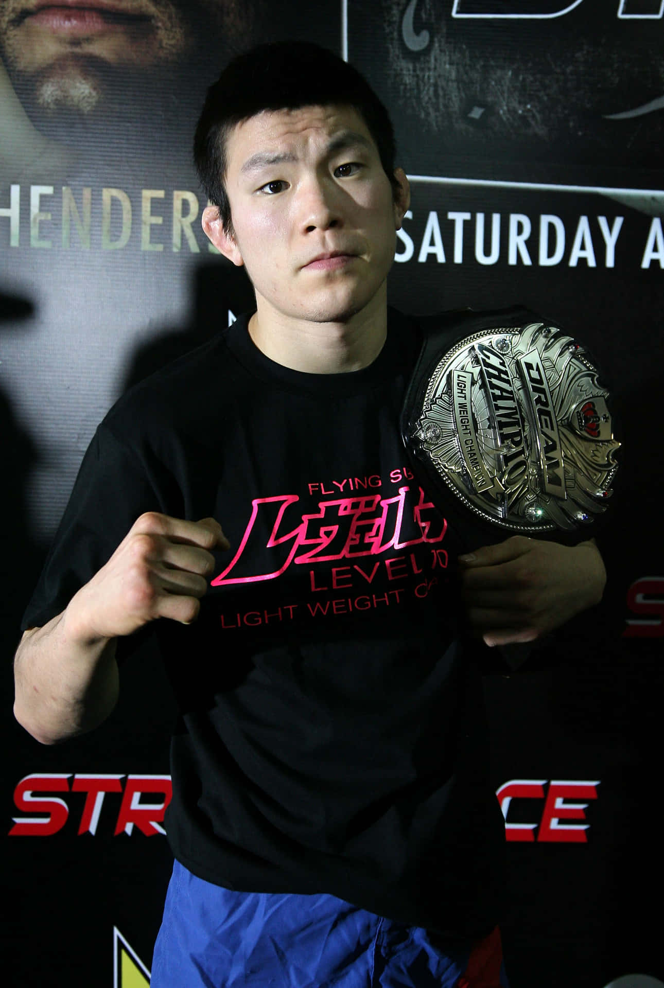 Shinya Aoki Asserting Dominance In The Strikeforce World Championship Tripleheader Background