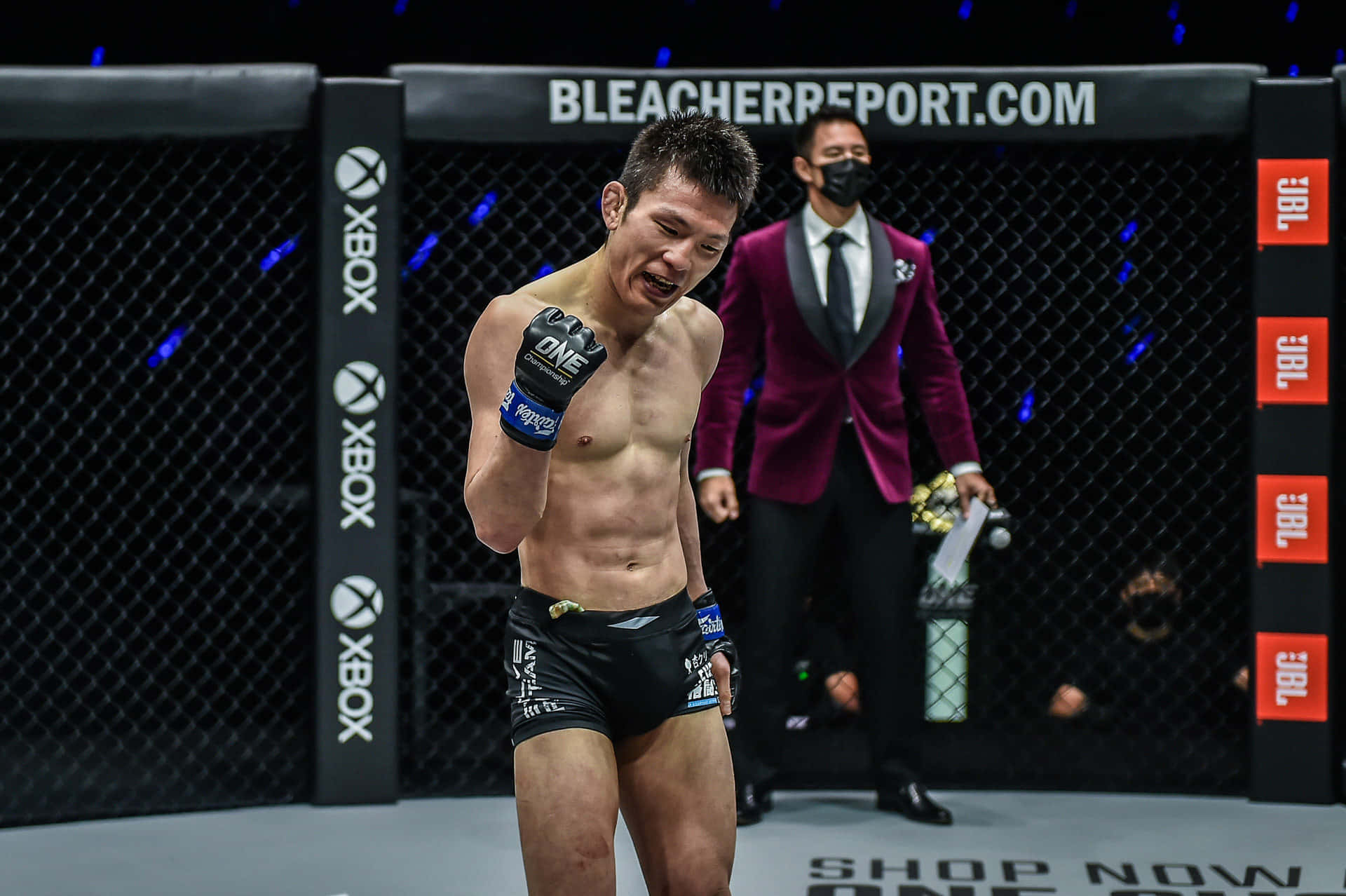 Shinya Aoki Celebrating Win Over Eduard Folayang Background