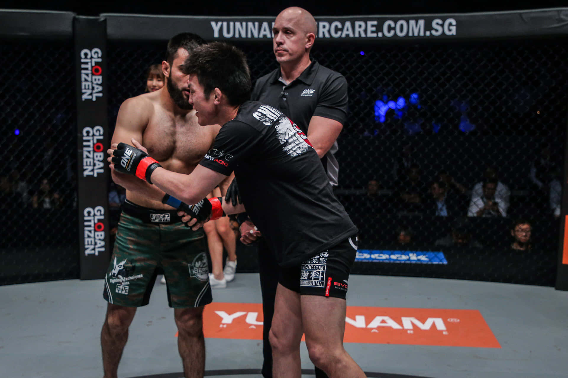 Shinya Aoki Hugging Opponent Before Game Background