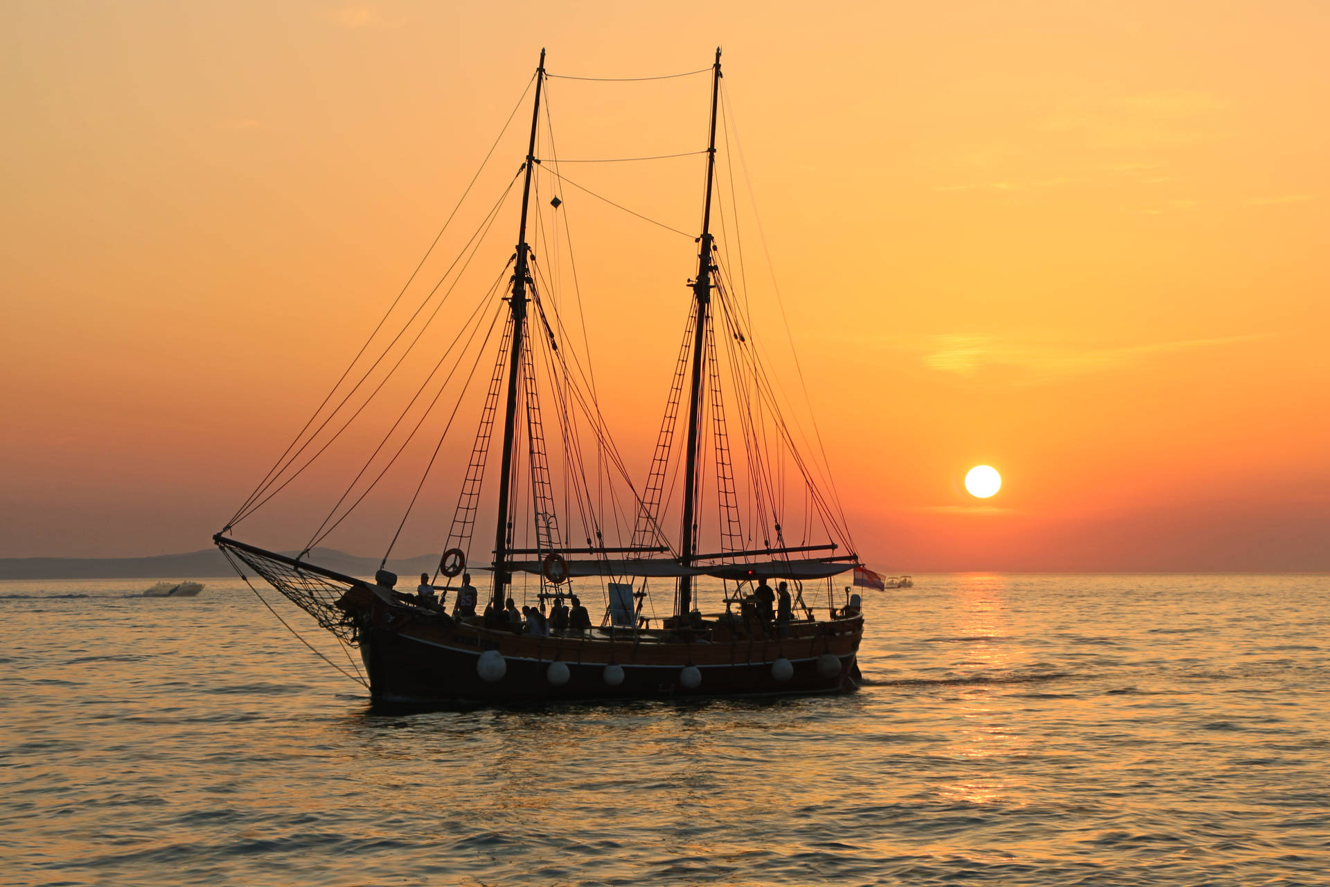 Ship And Beautiful Sunset Background