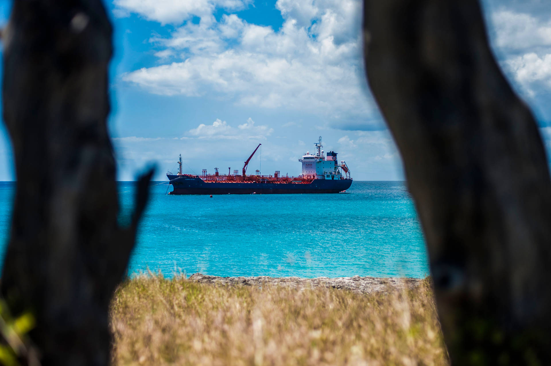 Ship Sailing On Barbados Background