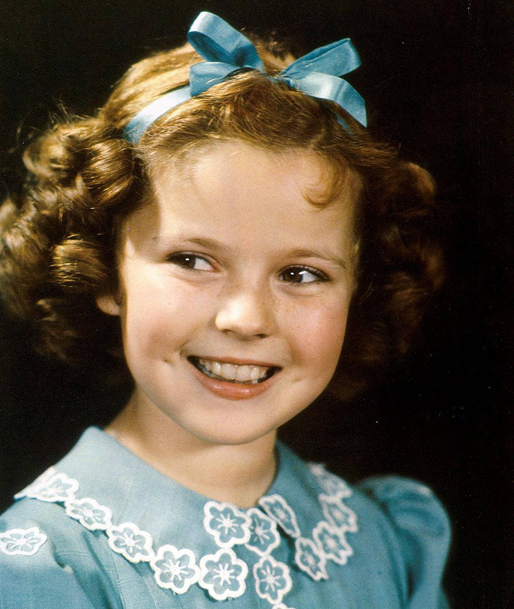 Shirley Temple In A Blue Dress Background