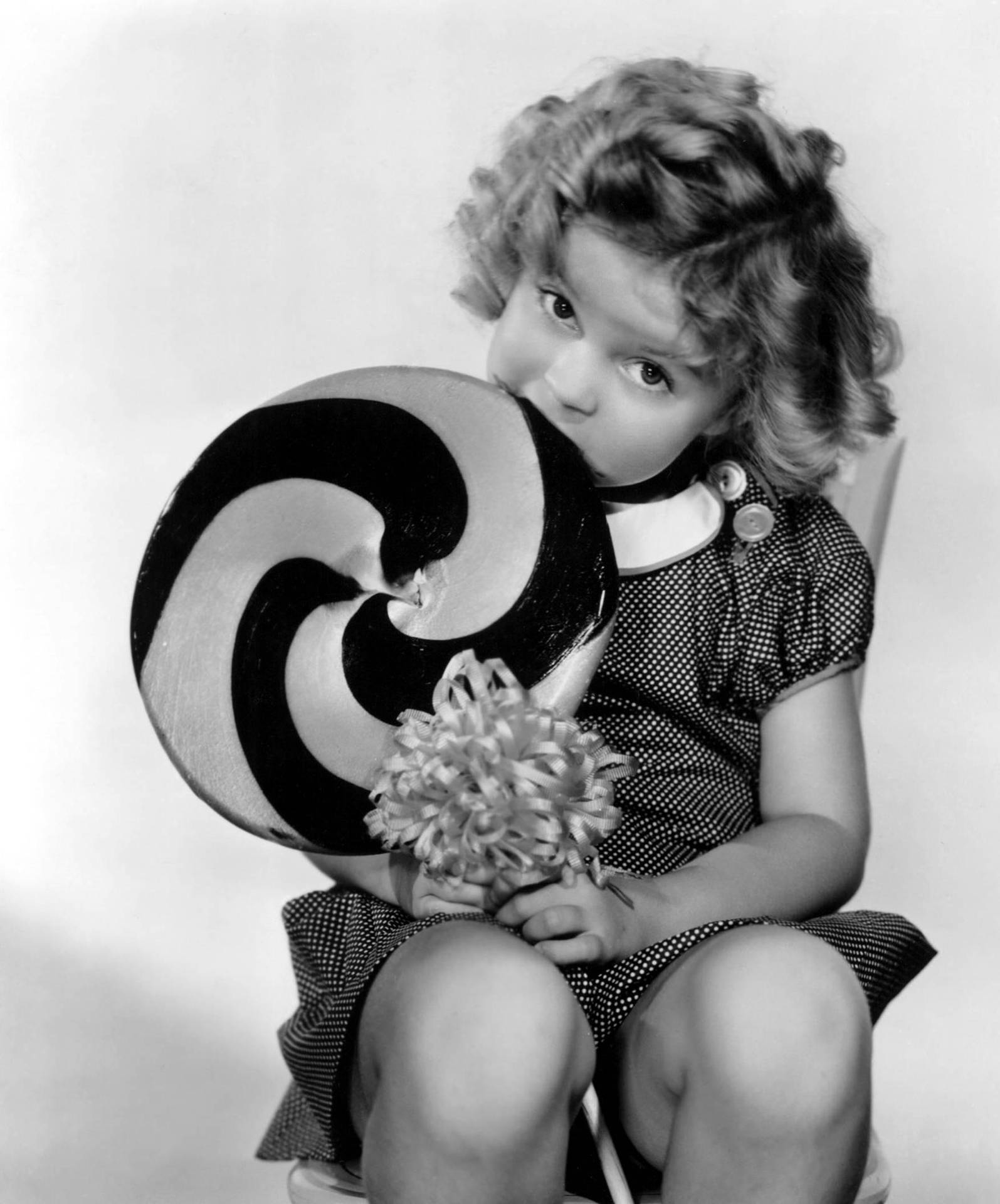 Shirley Temple With A Lollipop Background
