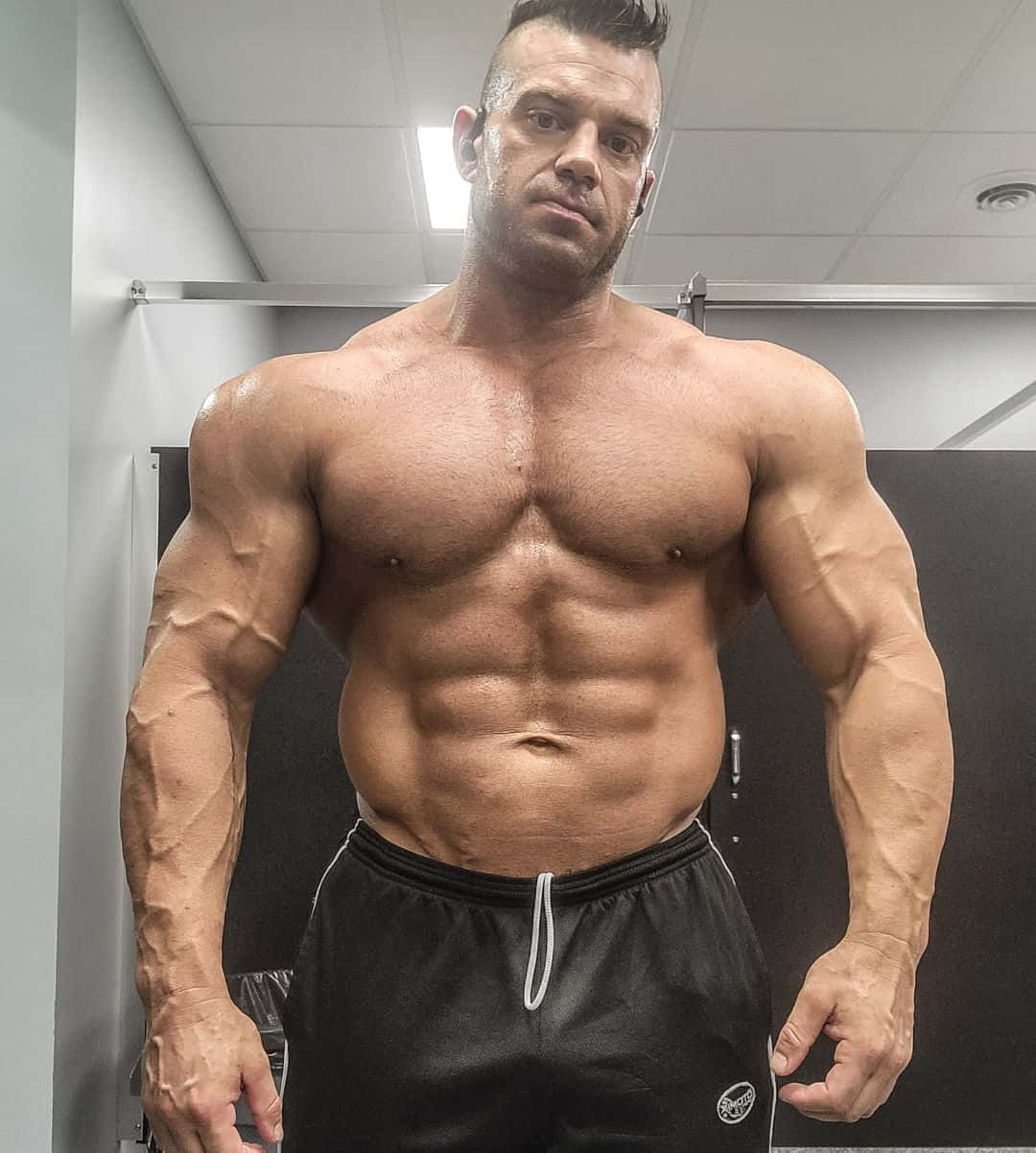 Shirtless Brian Cage Background