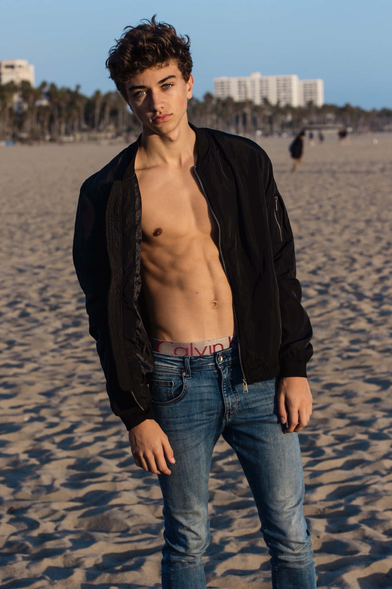 Shirtless Young Man Beach Portrait Background