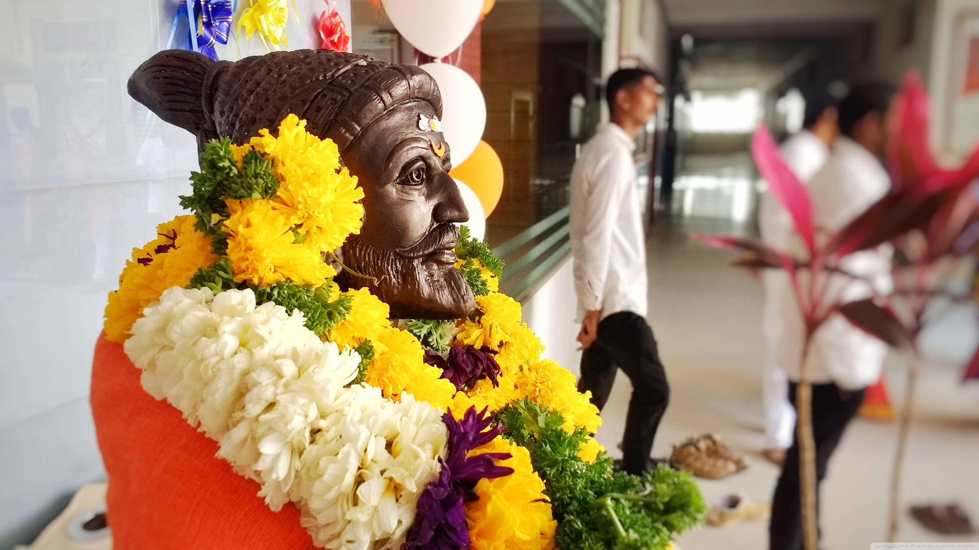 Shivaji Maharaj Statue With Flowers And Garlands Hd Background