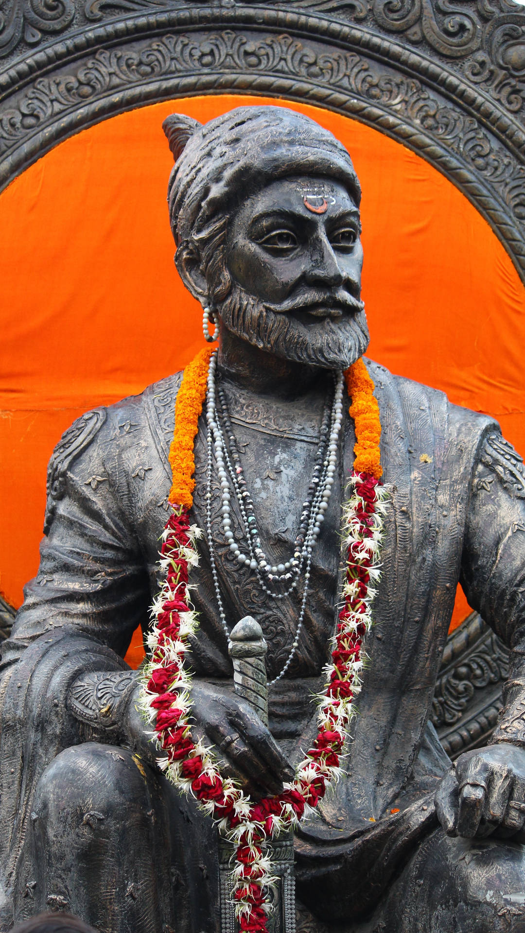 Shivaji Maharaj With Red And Orange Neck Garland Background