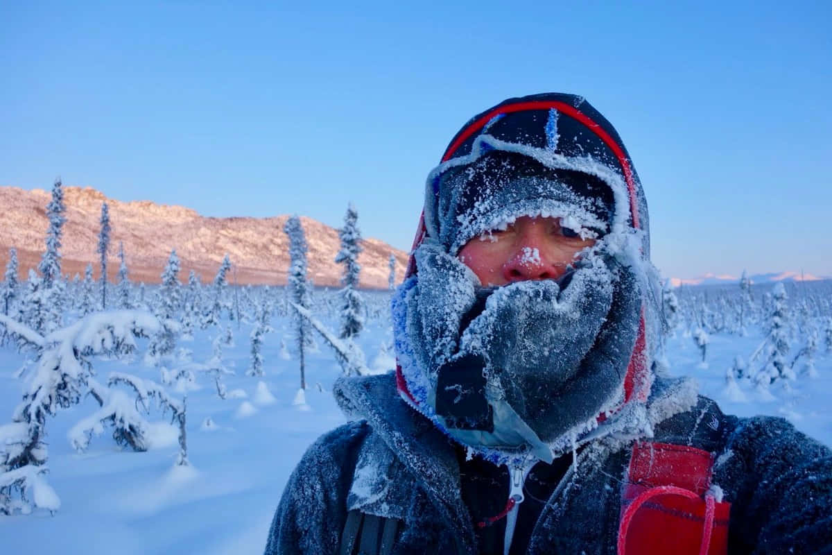 Shivering Person Surrounded By Snow [wallpaper]