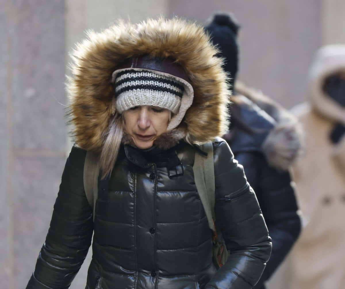 Shivering Woman Wearing Fur [wallpaper]