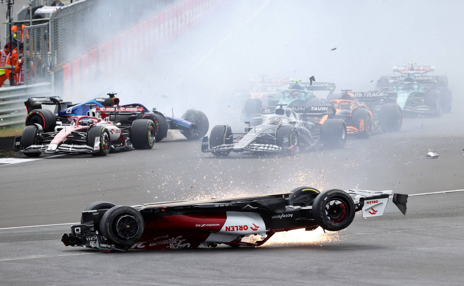 Shocking F1 Car Crash On The Race Track Background