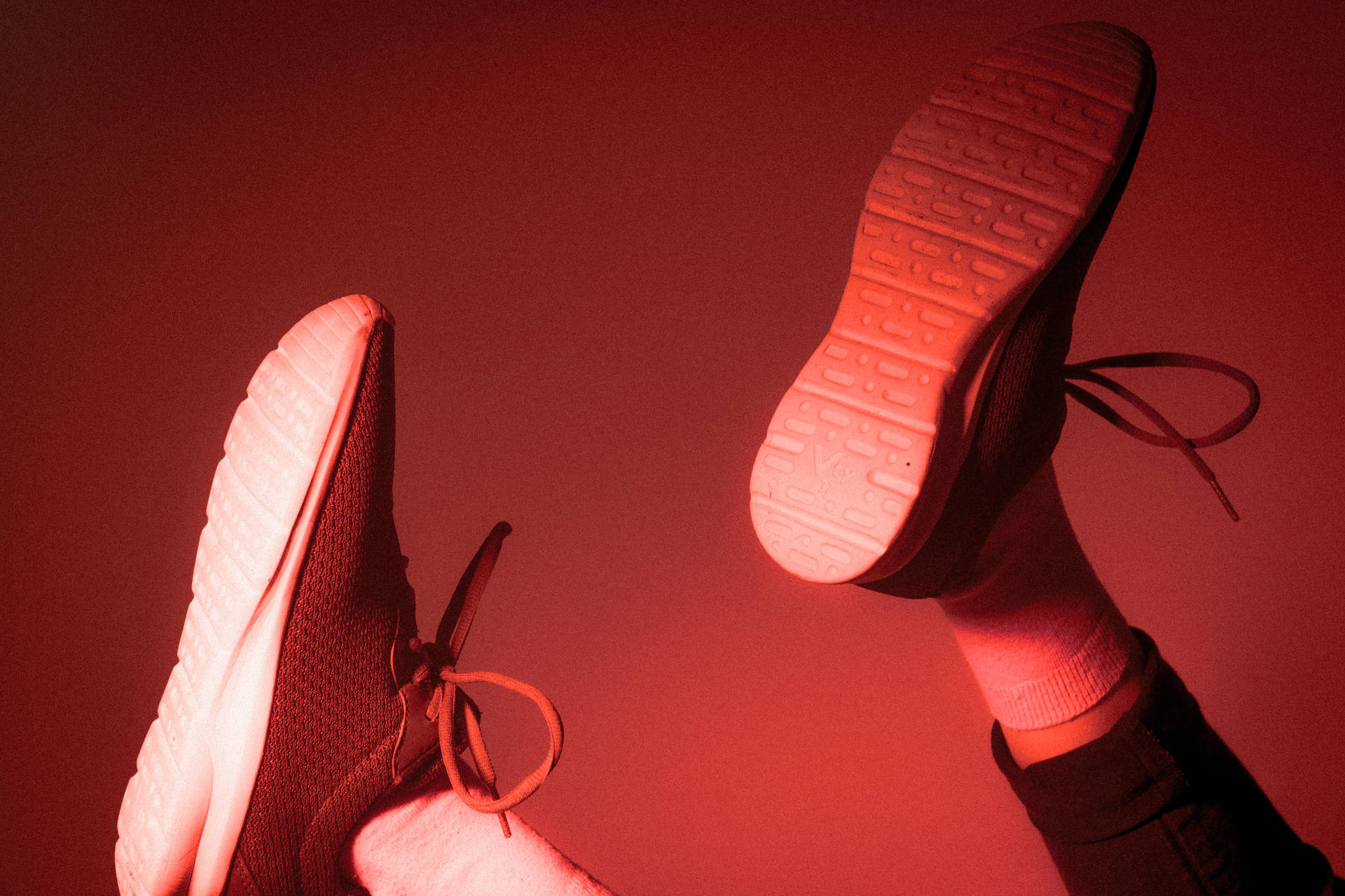 Shoes In Red Light Background