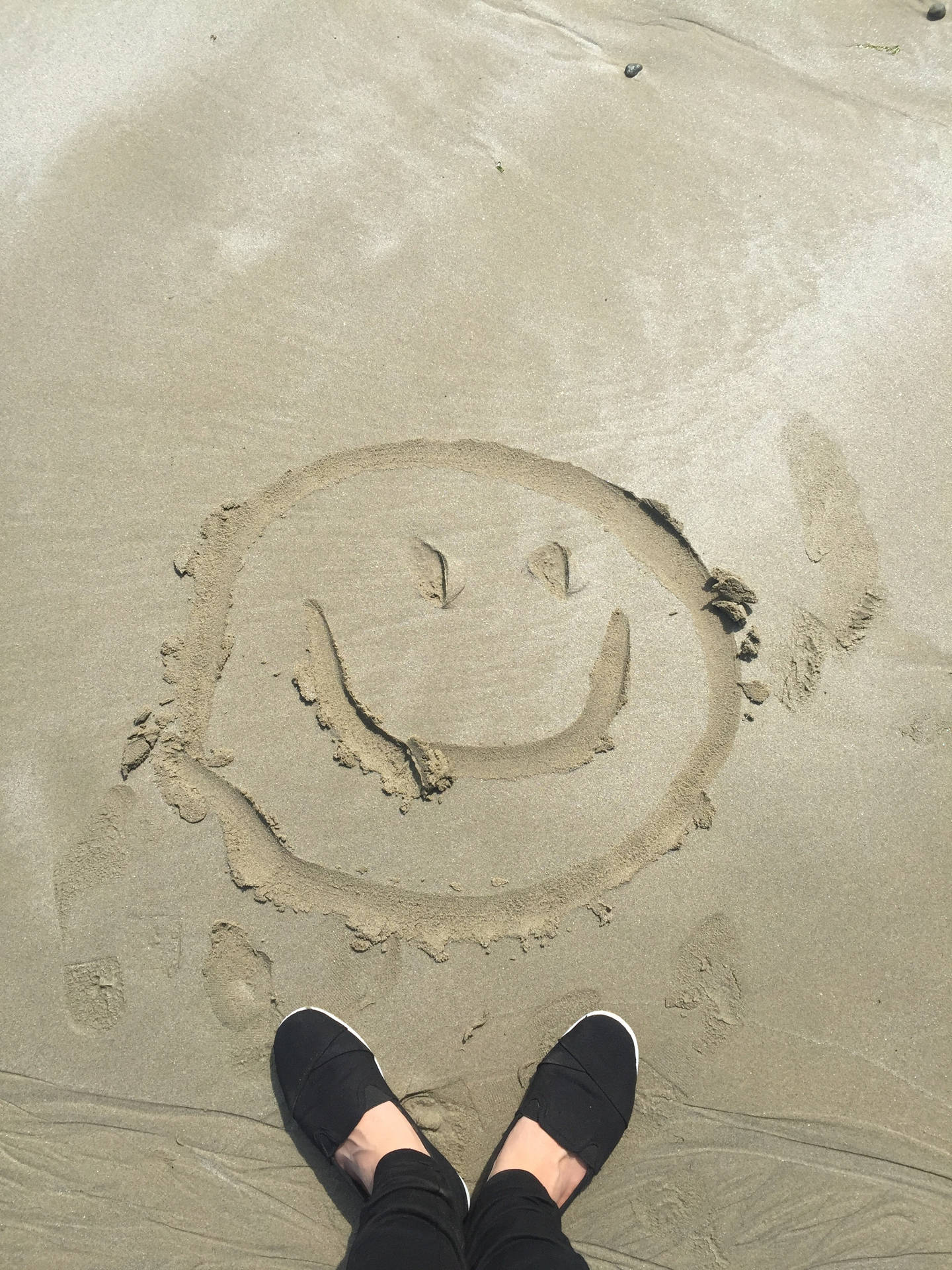 Shoes Smiley Face On Sand