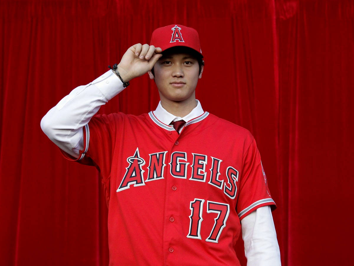 Shohei Ohtani Tipping His Cap Background