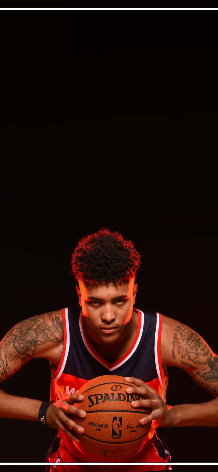 Shooting Guard Devin Booker Showcasing The New Iphone Background