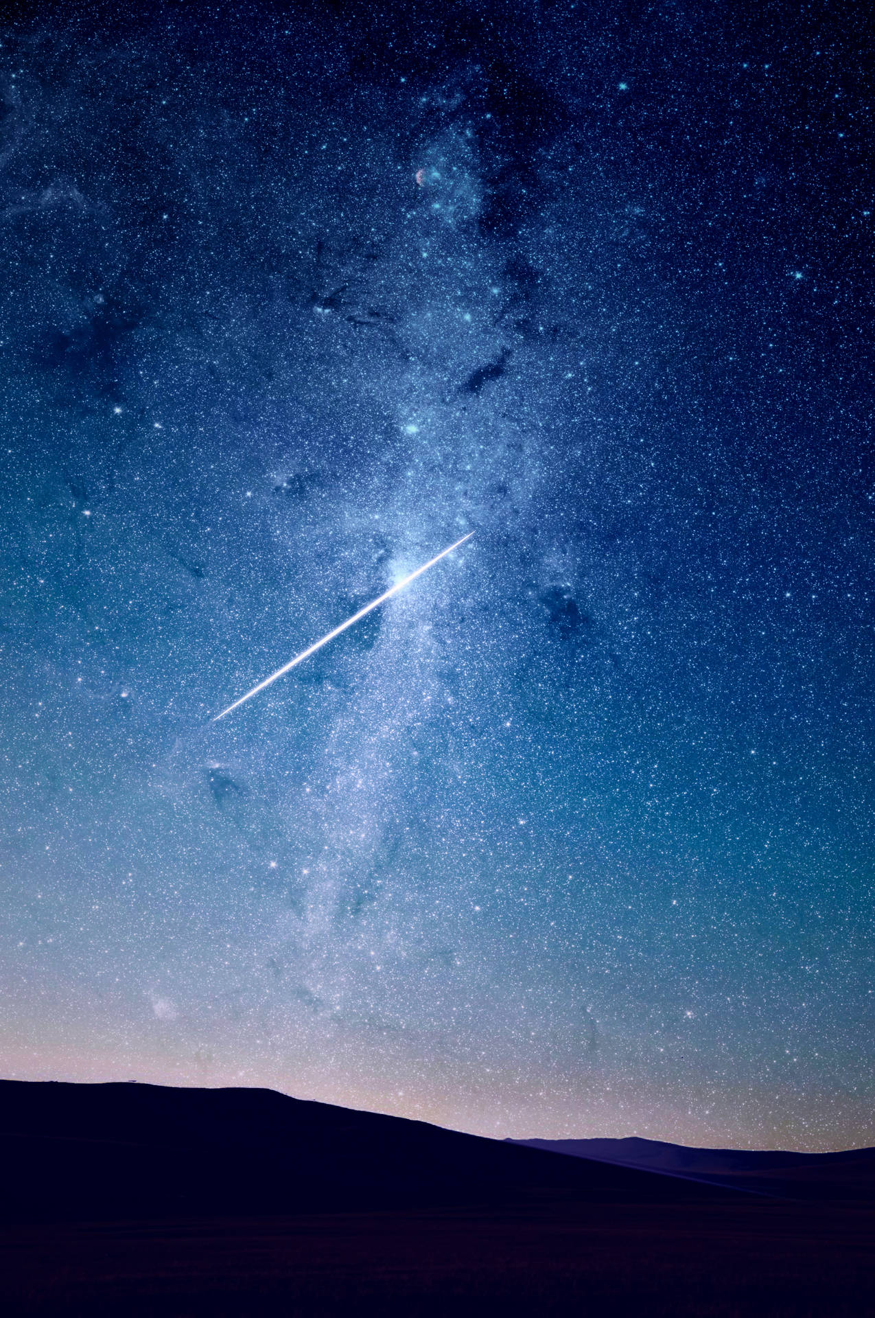 Shooting Star On Blue Sky Background