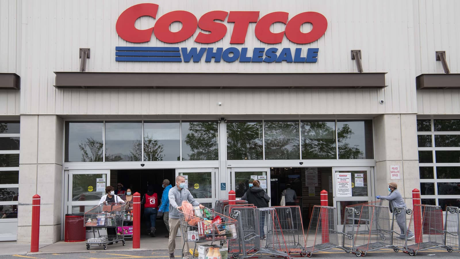 Shoppers Pushing Carts Costco Wholesale Background