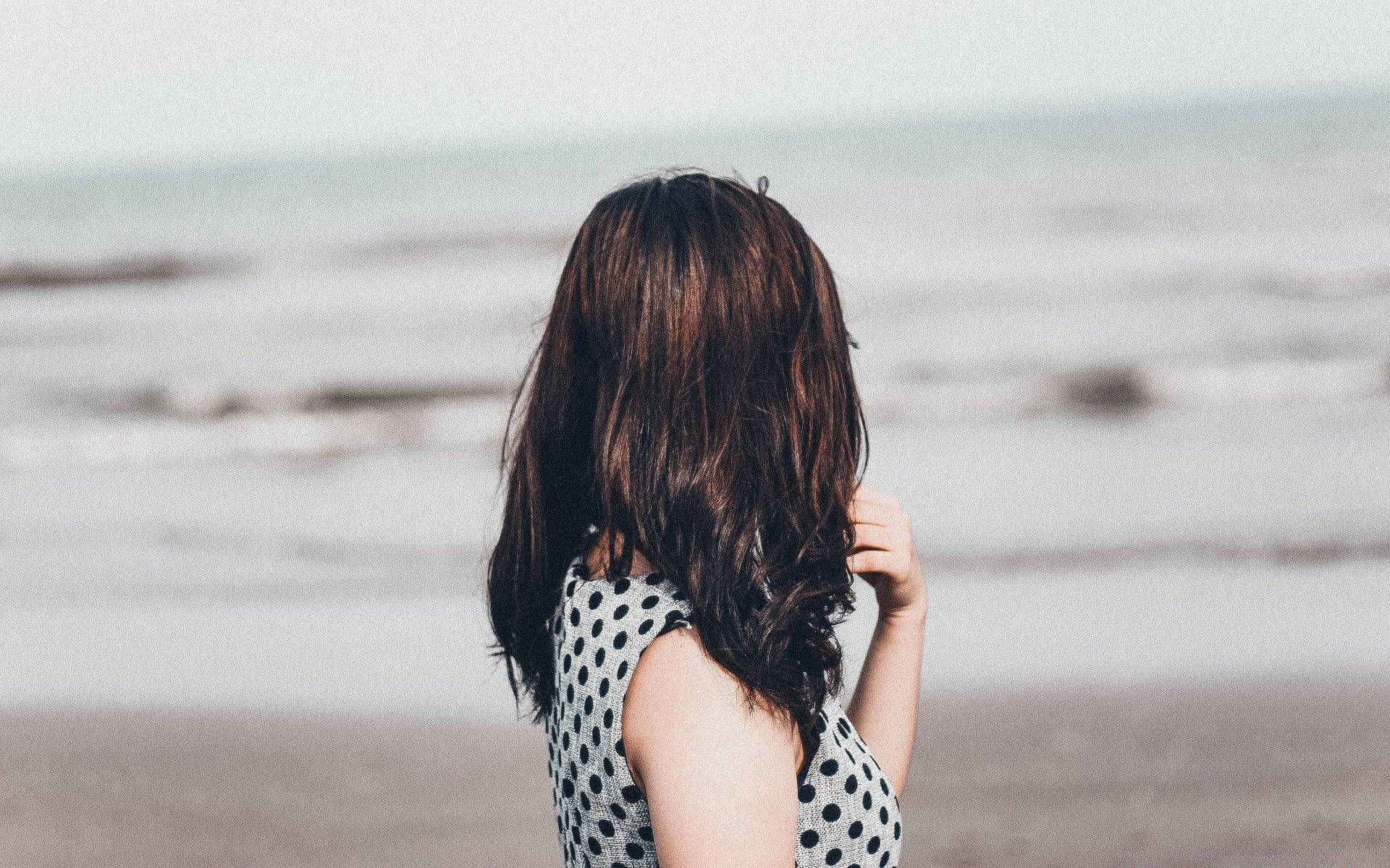 Short-haired Woman Beach Background