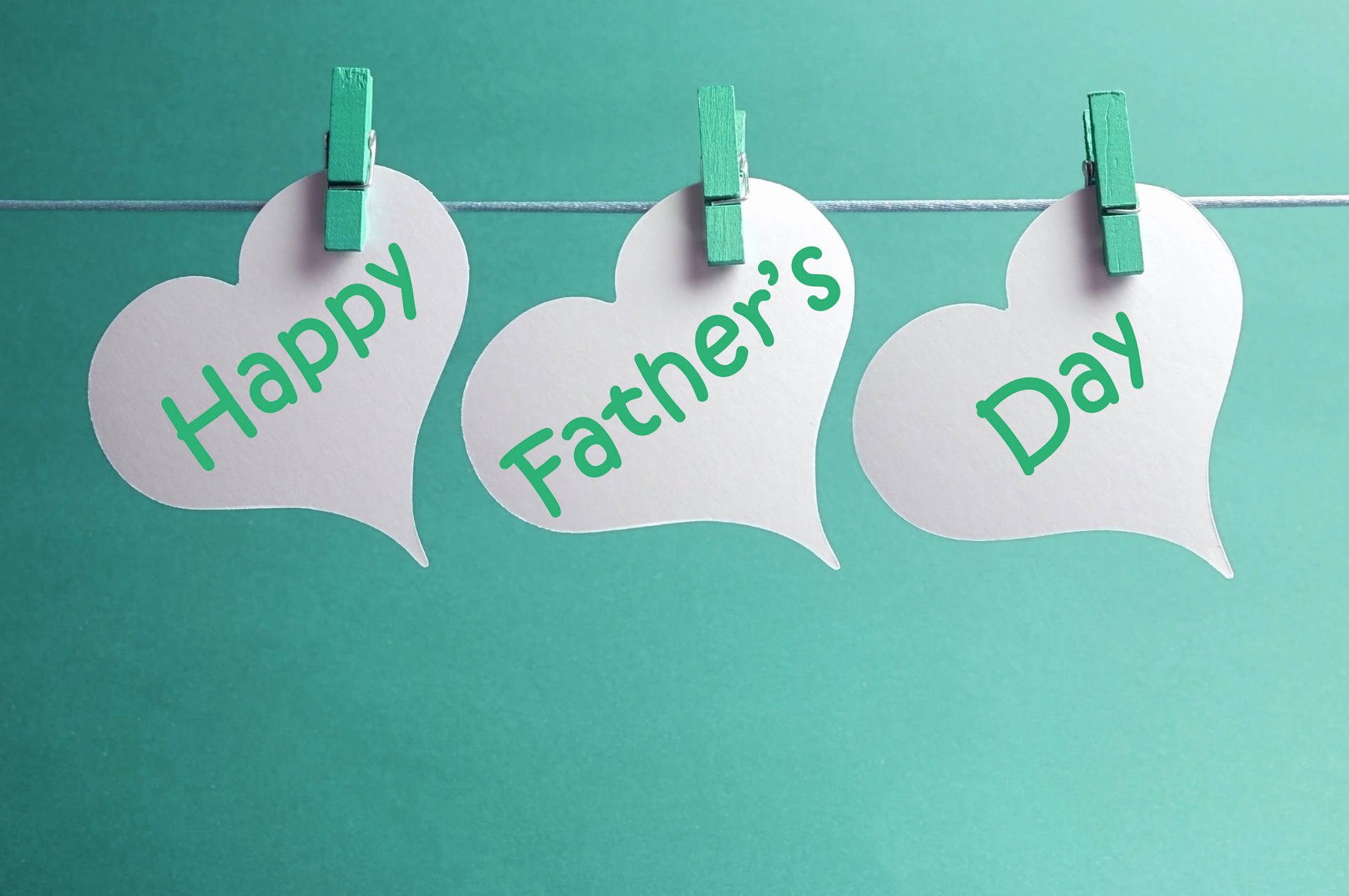 Show Dad He's Loved With These Quaint Father's Day Buntings Background