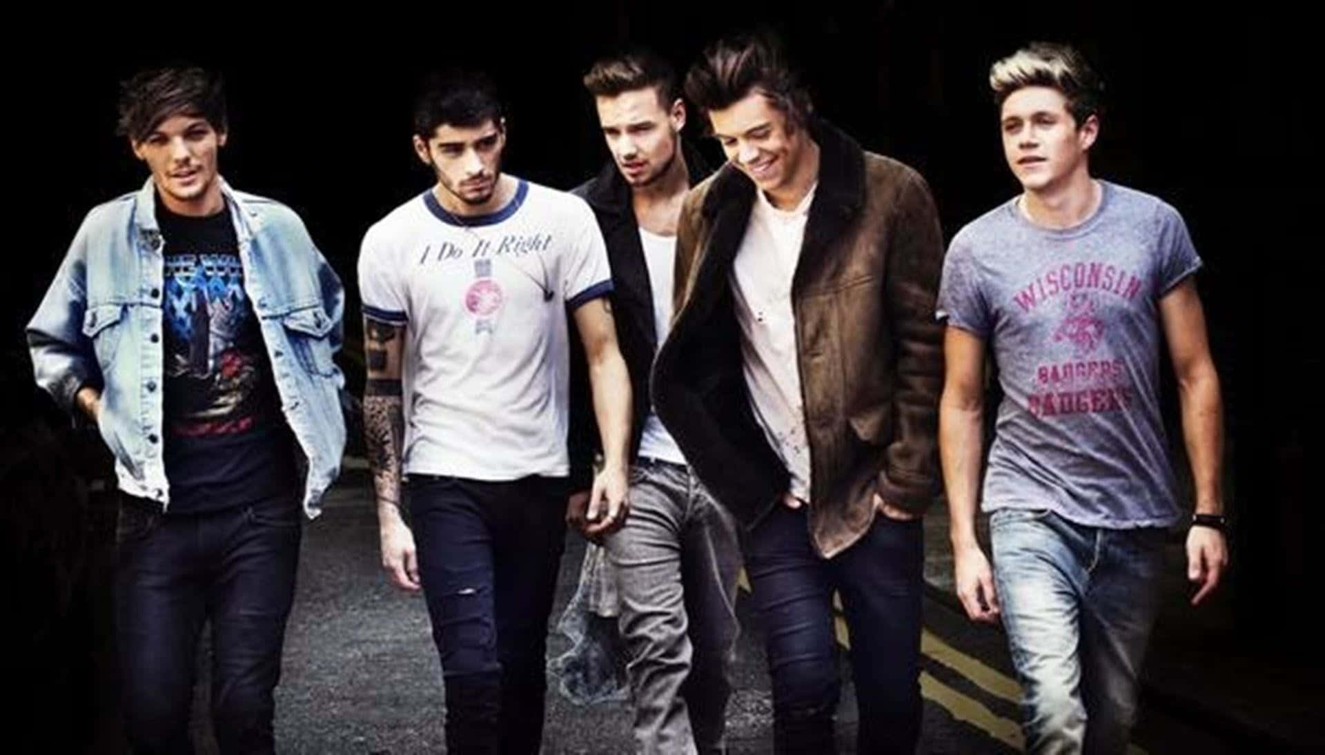 Show Your Love For One Direction With This Colorful And Fun Laptop Background