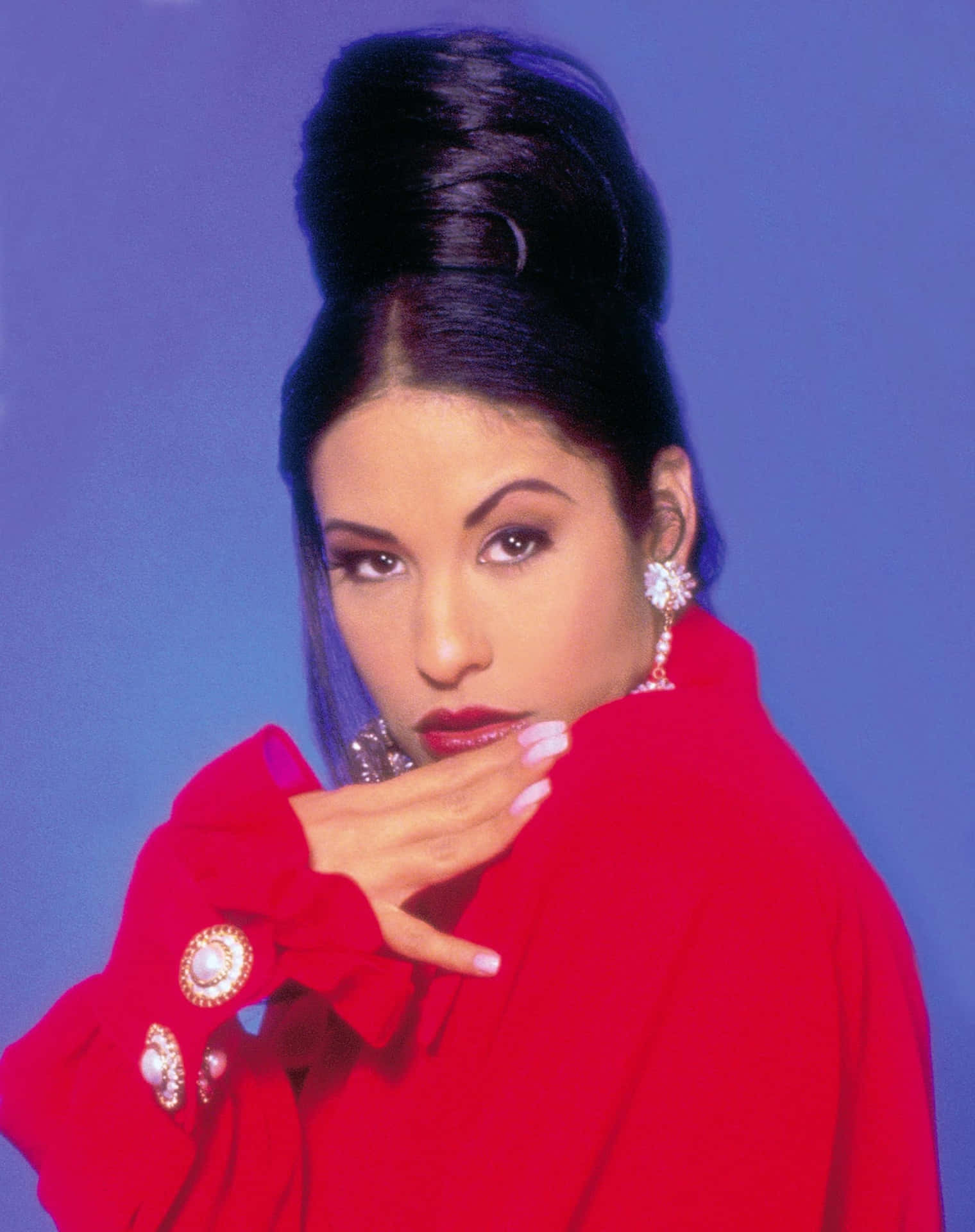 Show Your Love For The Queen Of Tejano, Selena Quintanilla, With Her Iconic Image On Your Iphone Background