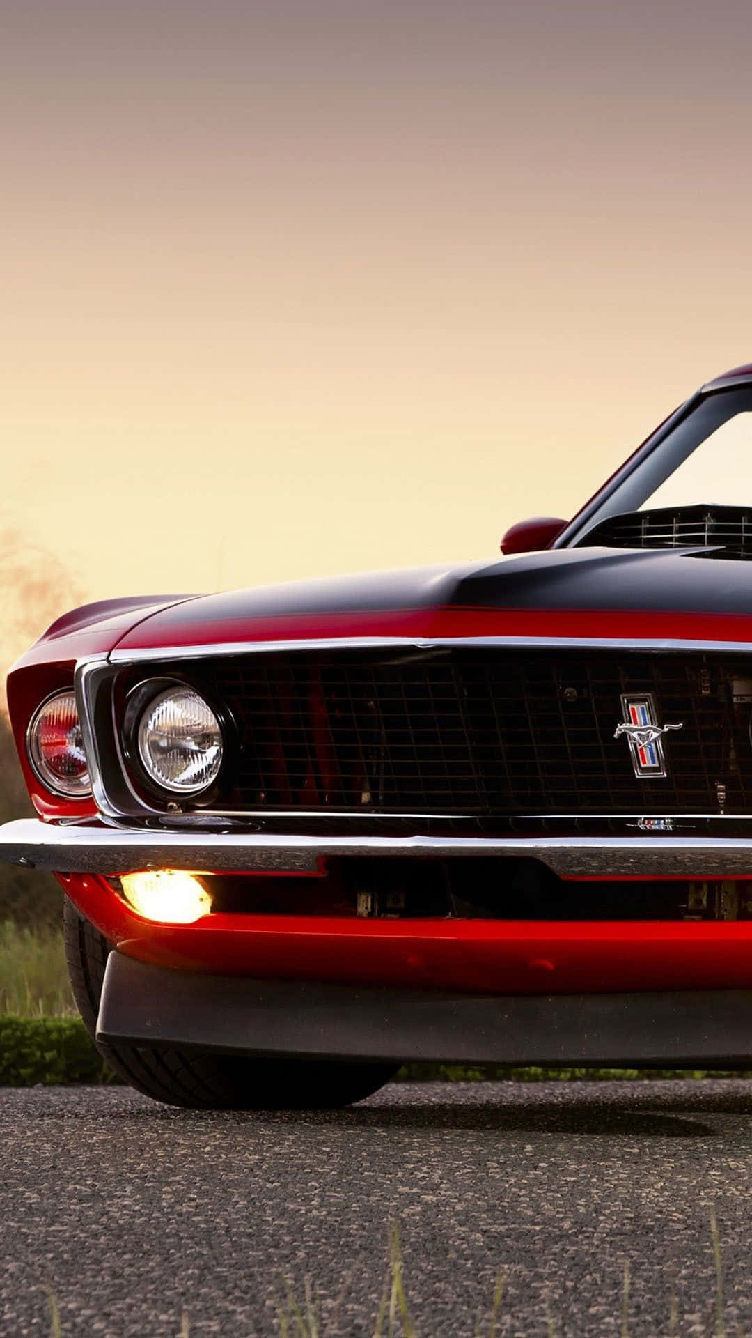 Showcase Your Sense Of Style With This Sleek Red Car Iphone Wallpaper