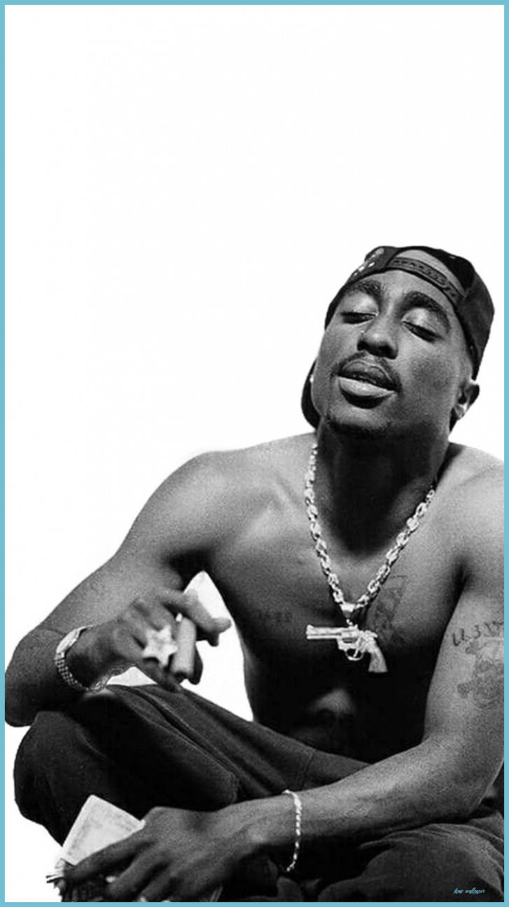 Showcasing The Iconic Best Of Tupac Background