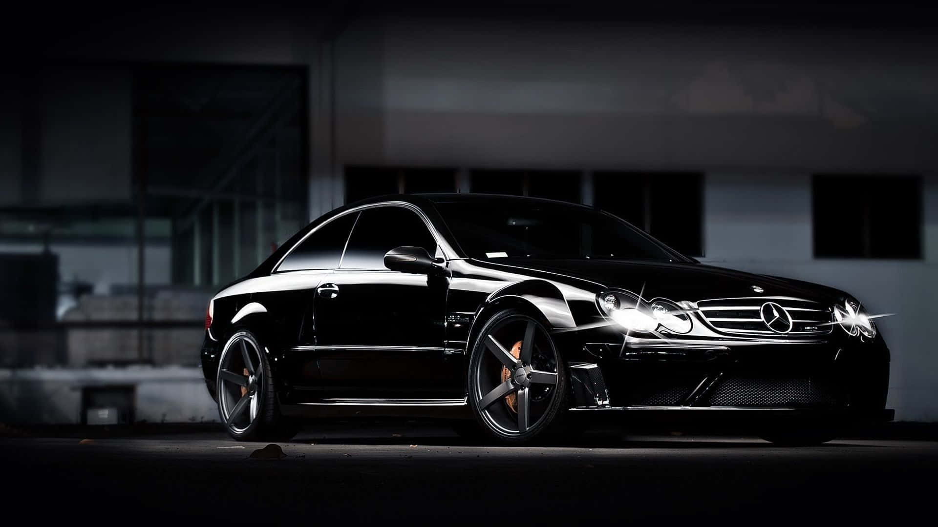 Showing Off The Black Color Of A Mercedes Background