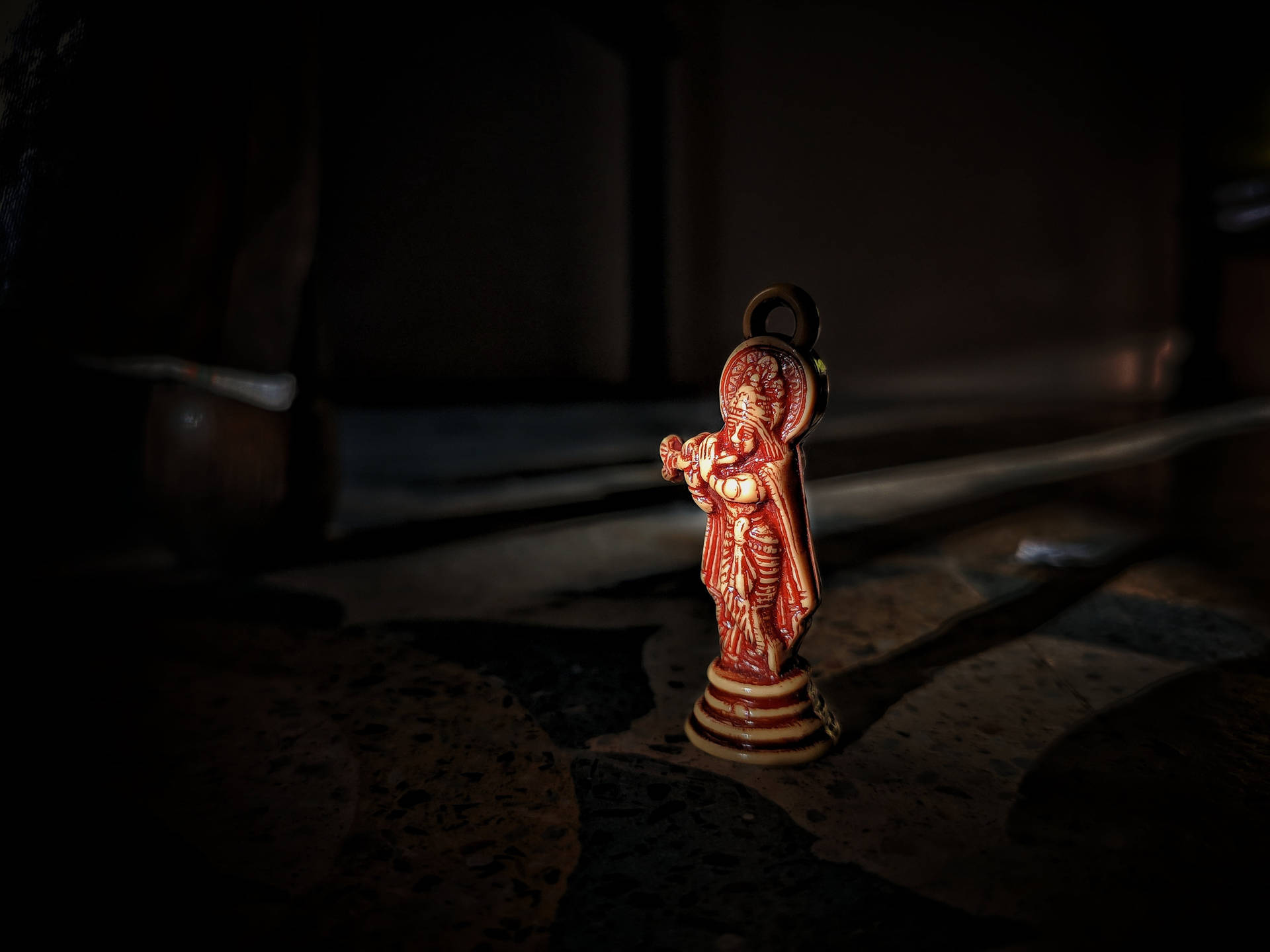 Shri Krishna Red Miniature Statue Background