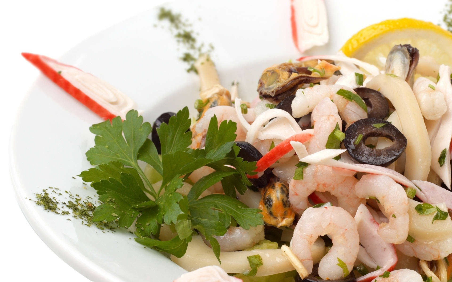 Shrimp Ceviche Garnished With Olives And Coriander