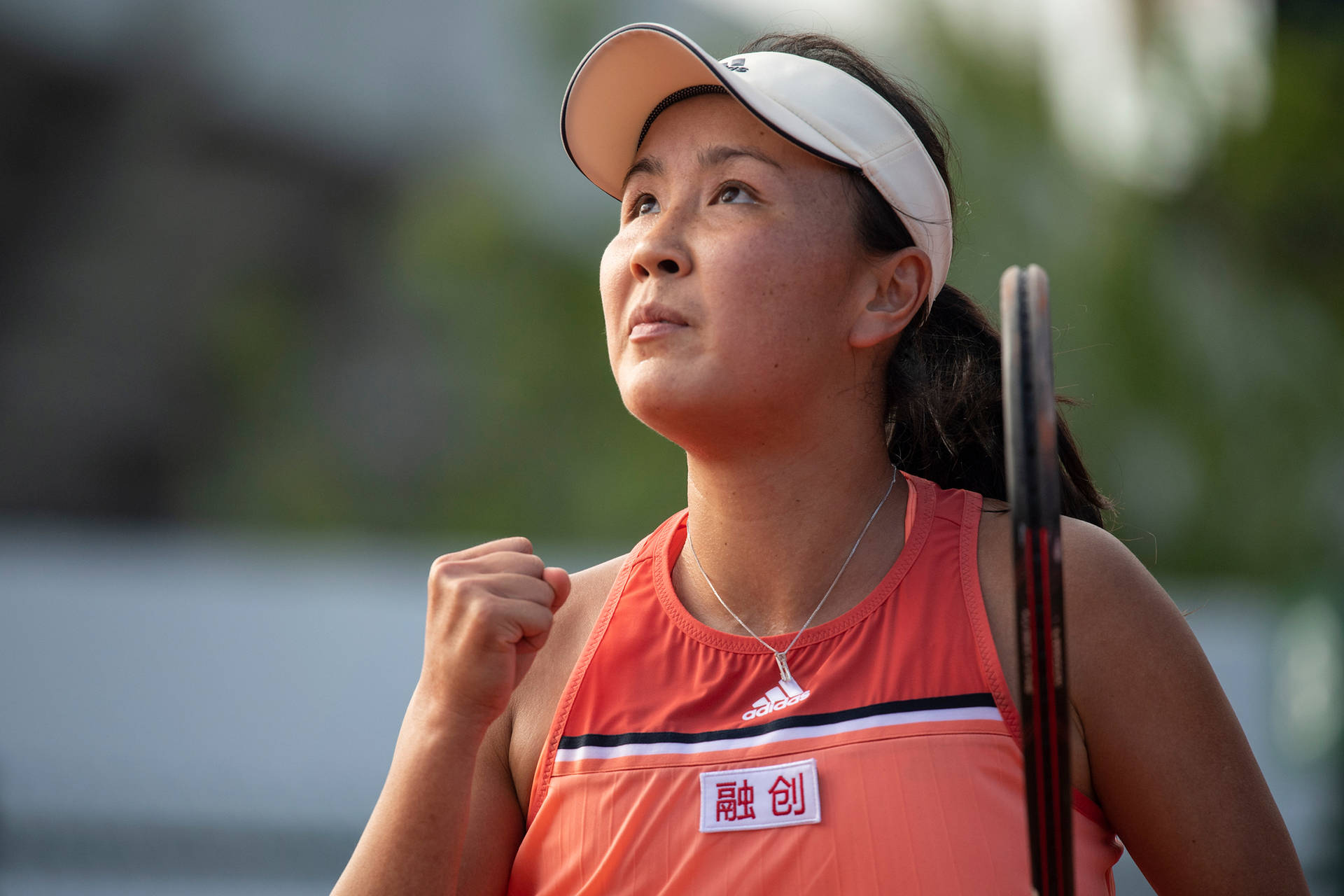 Shuai Peng Celebrating A Victory Background