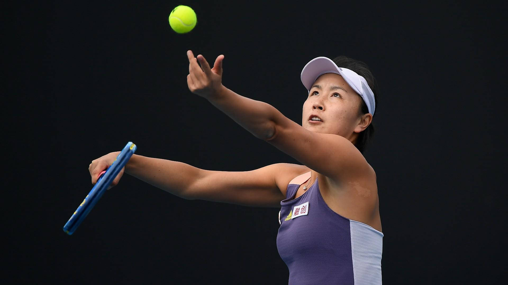 Shuai Peng In Action On The Court Background