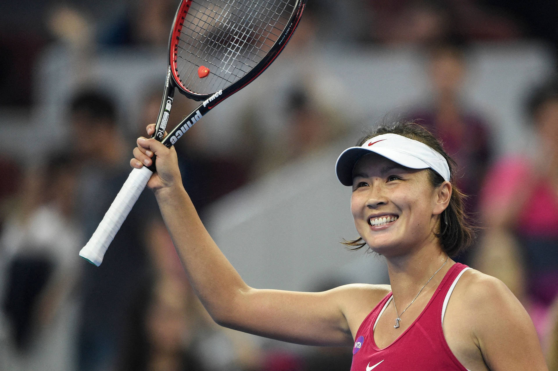 Shuai Peng Raising Her Racket