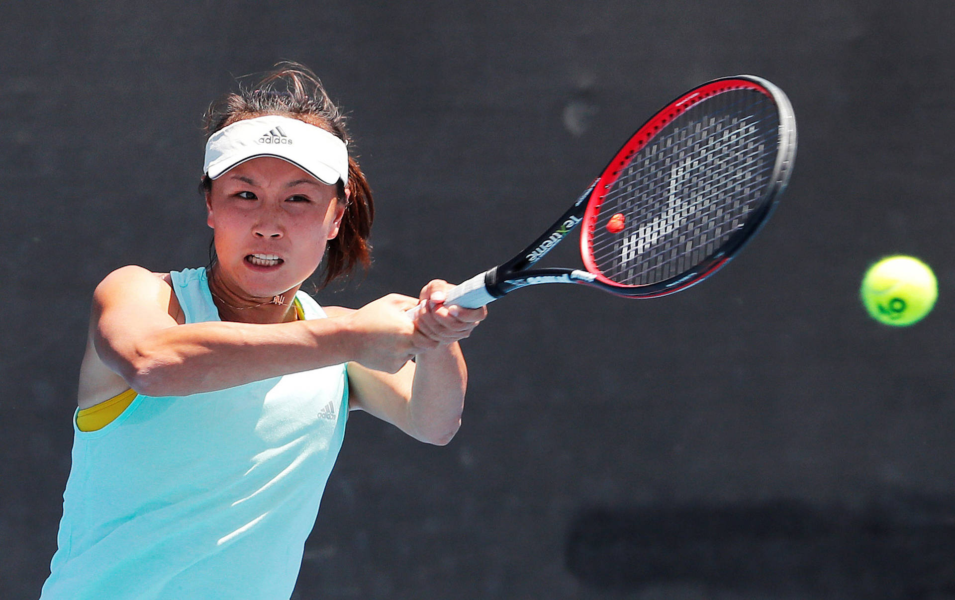 Shuai Peng Shining In Bright Sunlight During A Professional Tennis Match Background