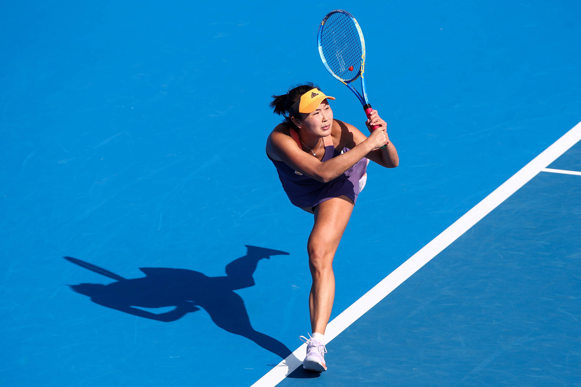 Shuai Peng, Tennis Professional In Action