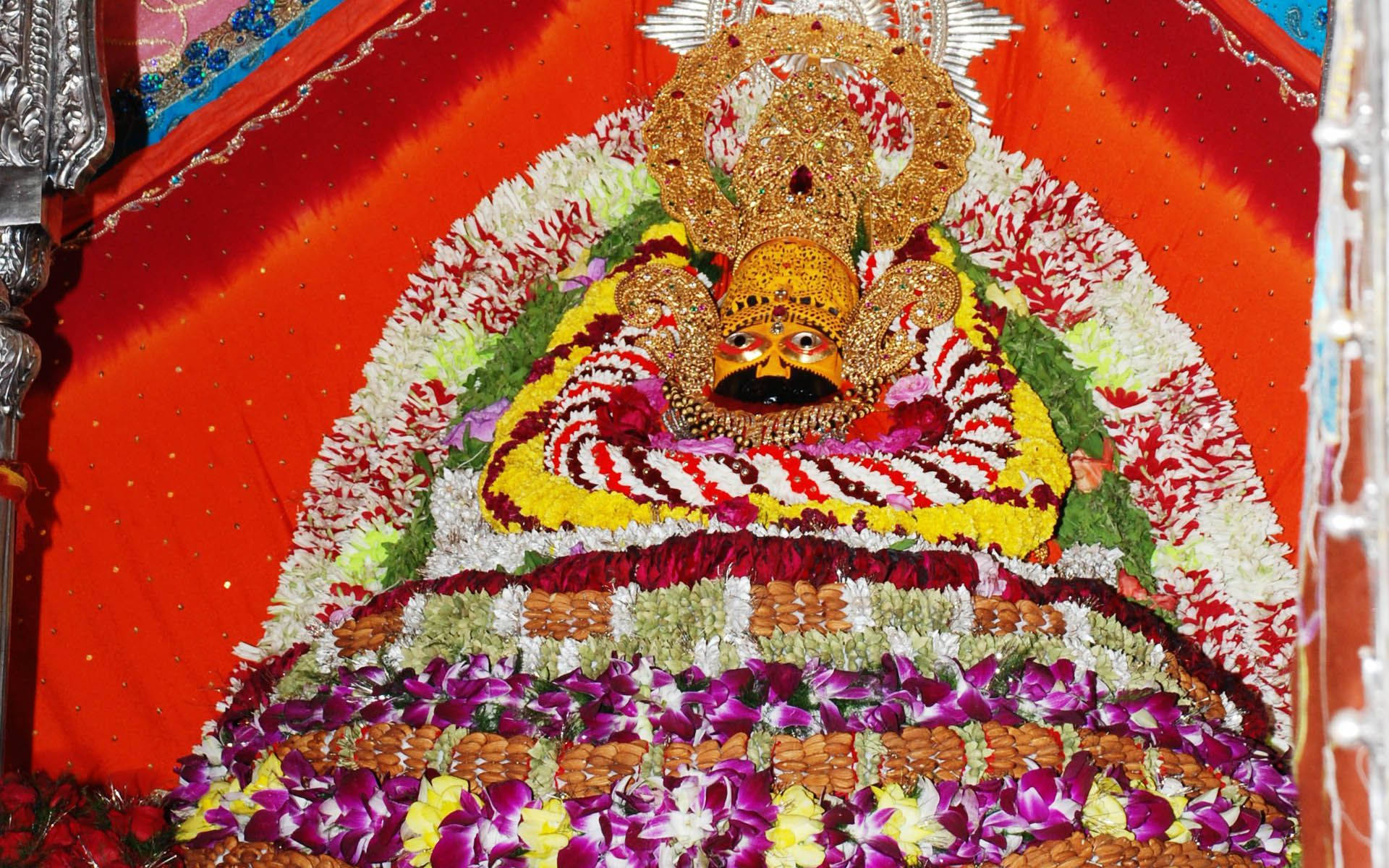 Shyam Baba Statue With Garlands Background