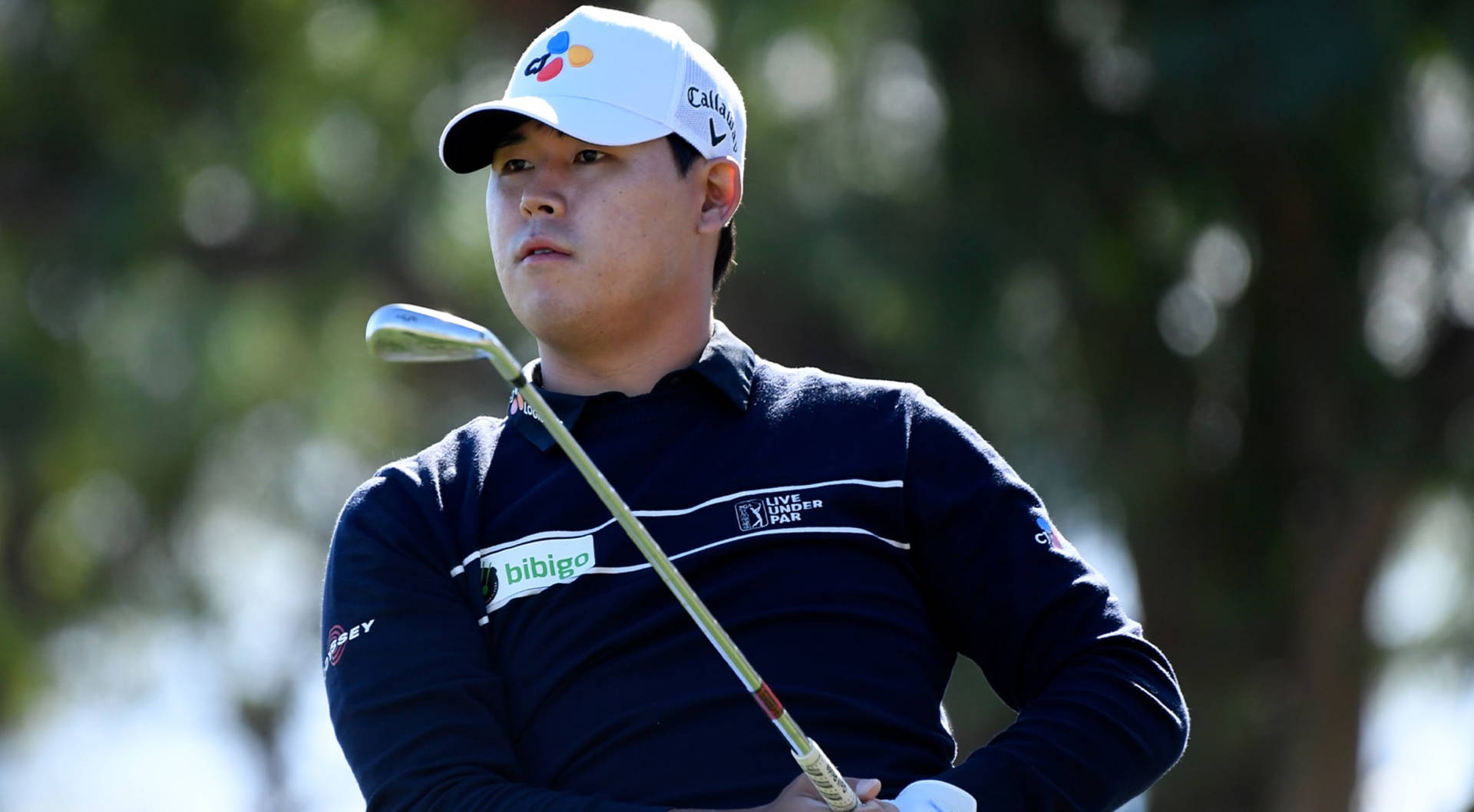 Si Woo Kim And Golf Club Background