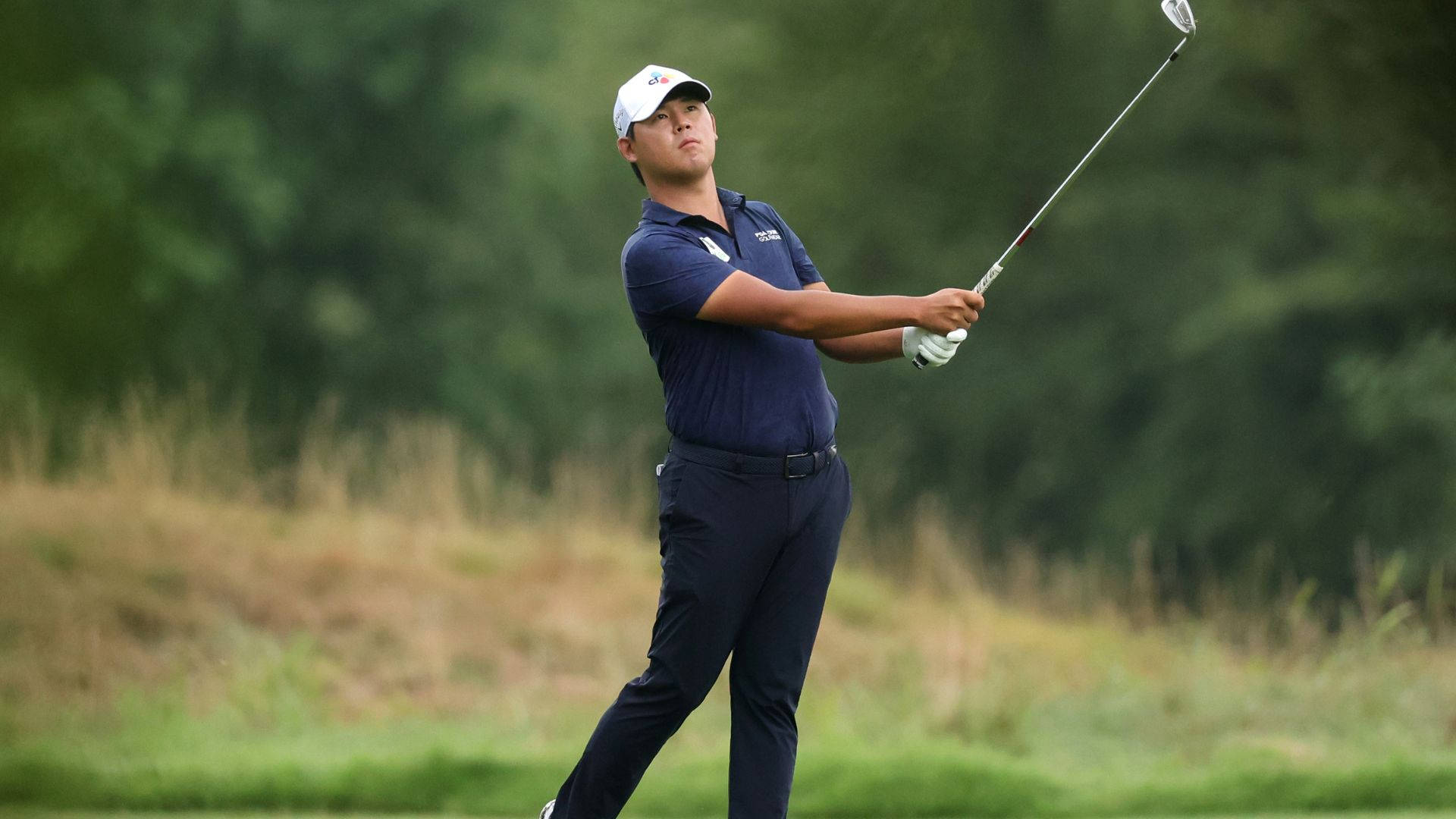 Si Woo Kim Looking Straight Ahead Background