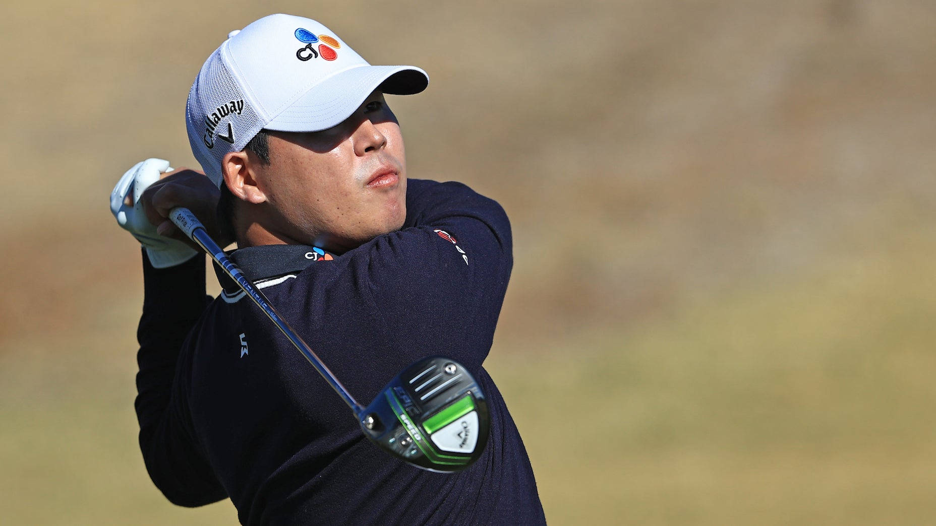 Si Woo Kim Solid Post-swing Stance Background