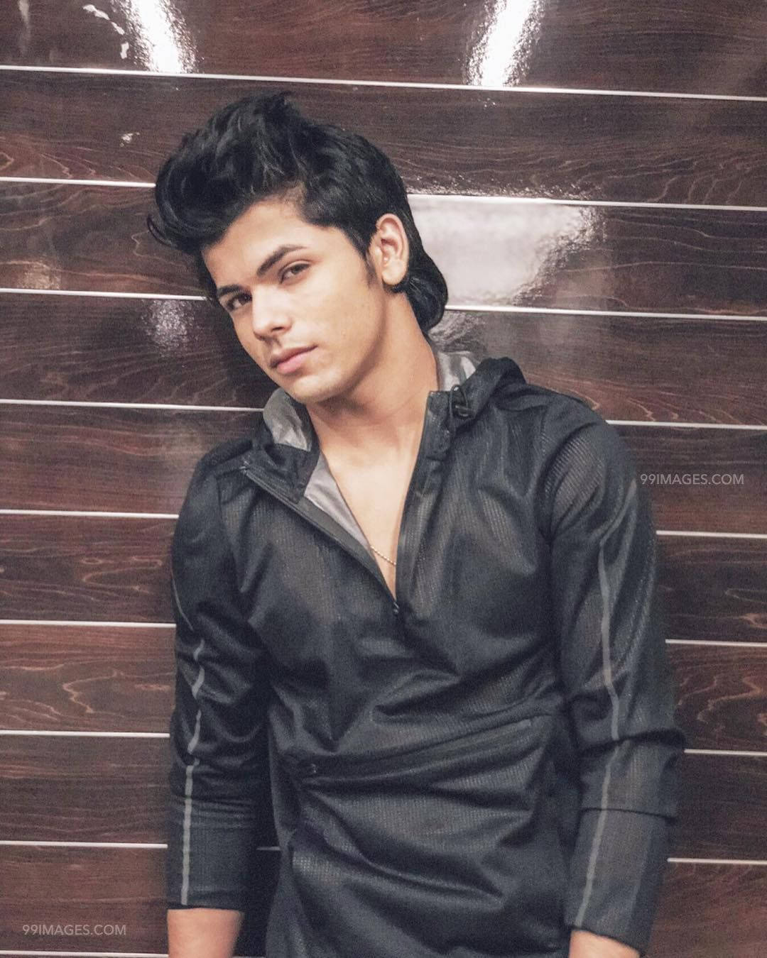 Siddharth Nigam Black Jacket Background