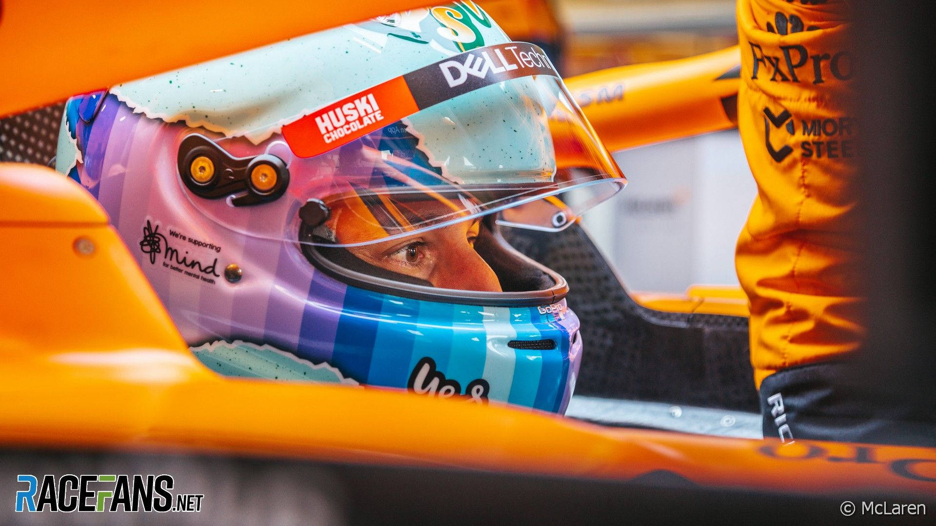 Side Photo Of Daniel Ricciardo Inside F1 Car Background