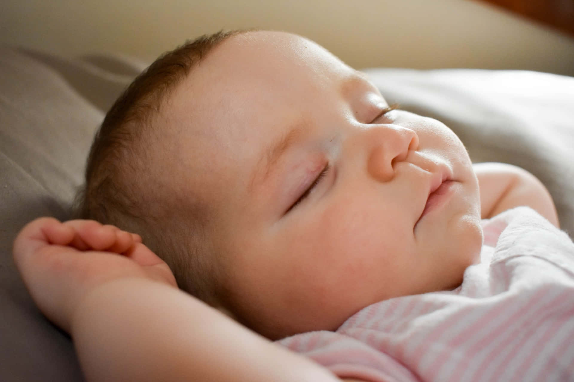 Side Profile Of A Sleeping Baby Background