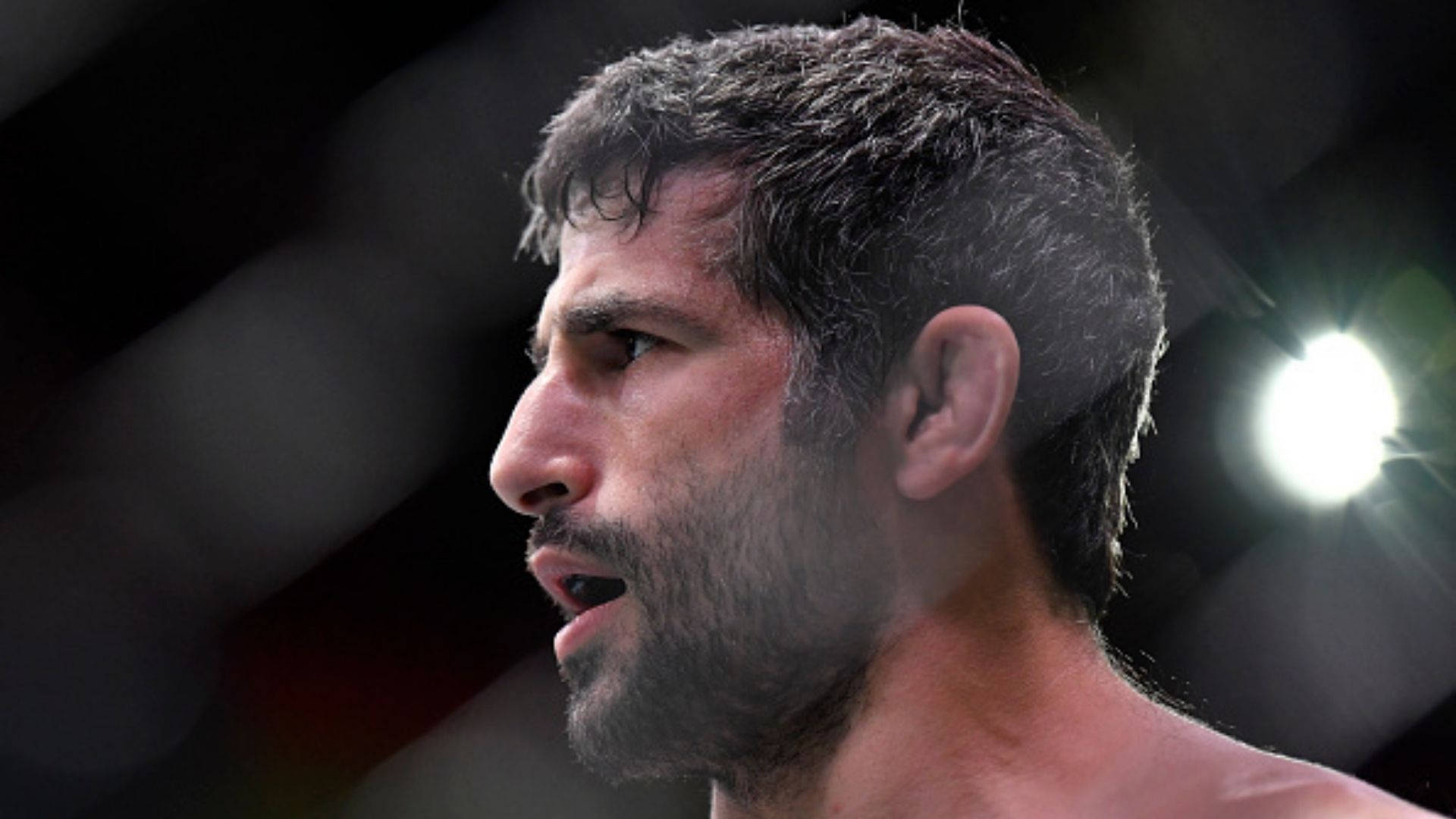 Side Profile Of Beneil Dariush Background