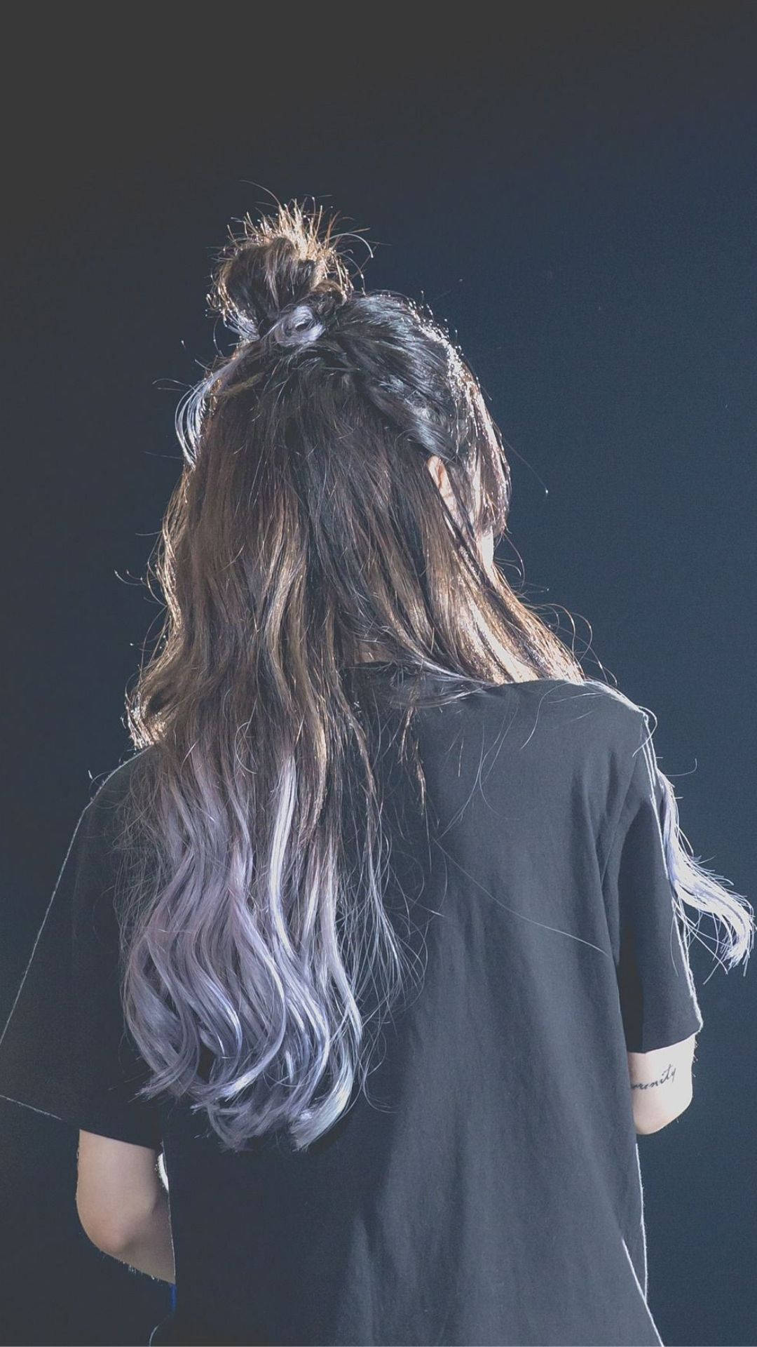 Side Profile Of K-pop Star Taeyeon Gazing Into The Distance. Background