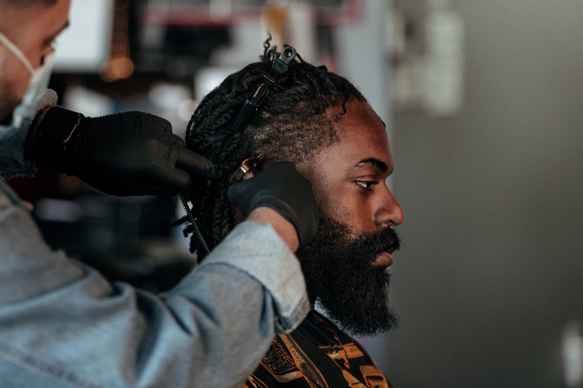 Side Profile Of Man Getting Haircut Background