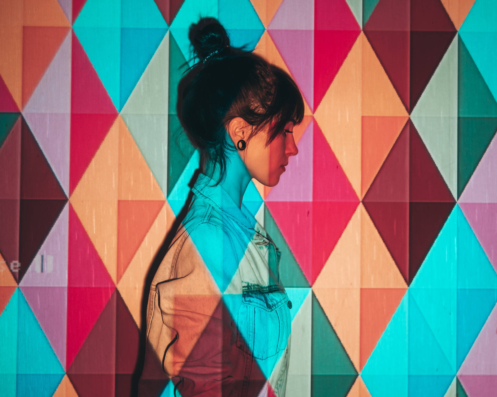 Side Profile Of Woman In Colorful Background Background