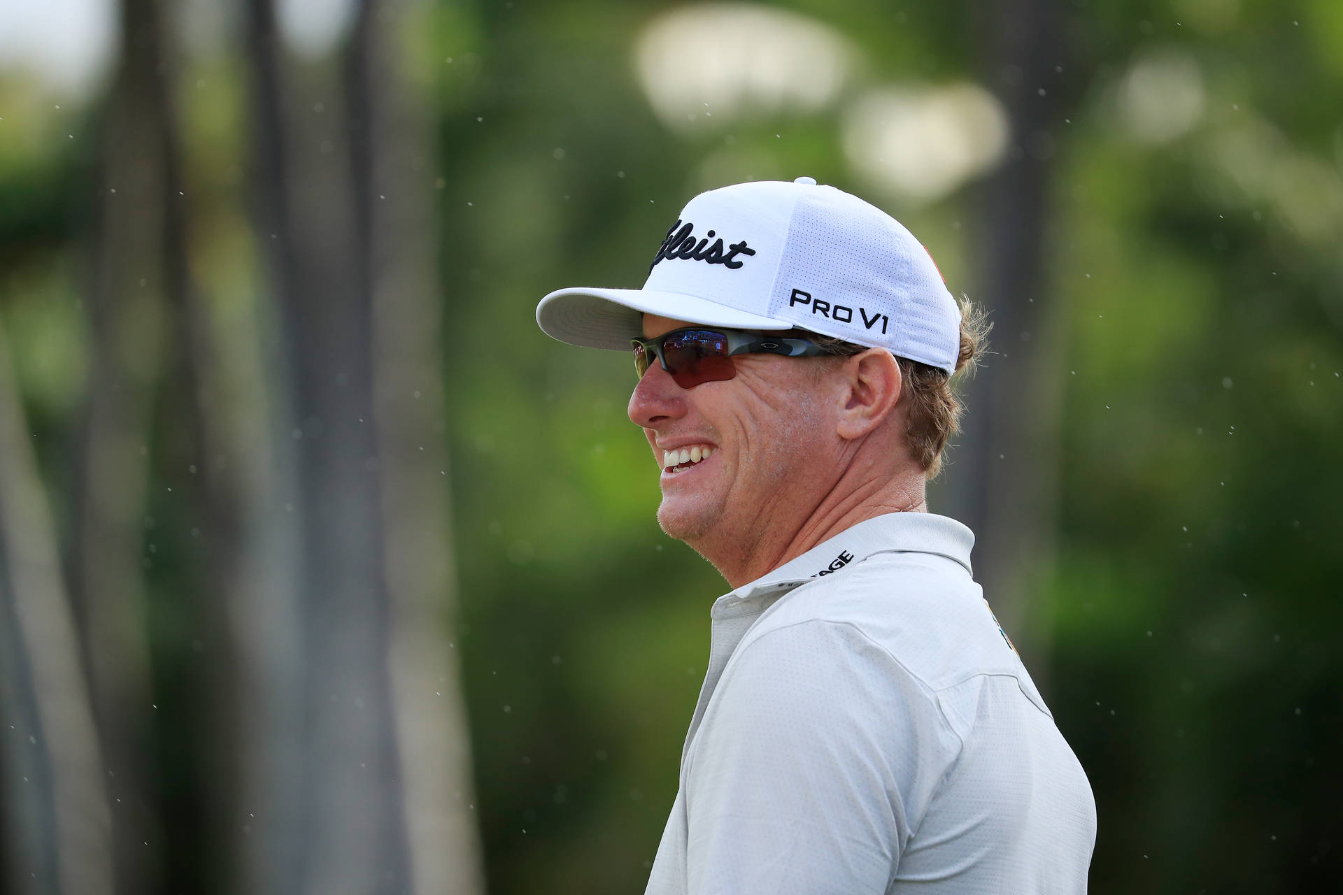 Side-view Charley Hoffman Smiling Background