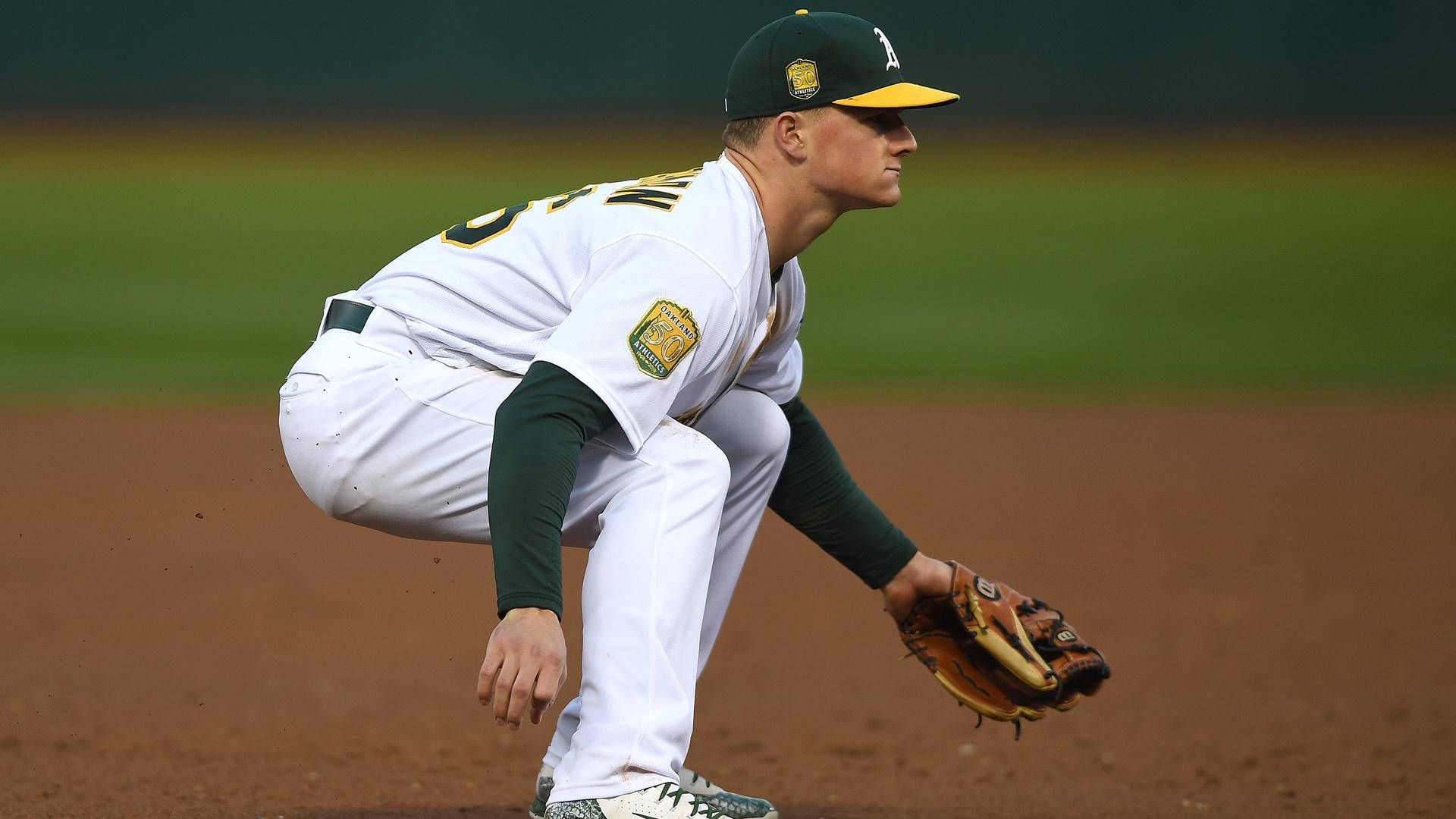 Side View Of Matt Chapman Crouching Background